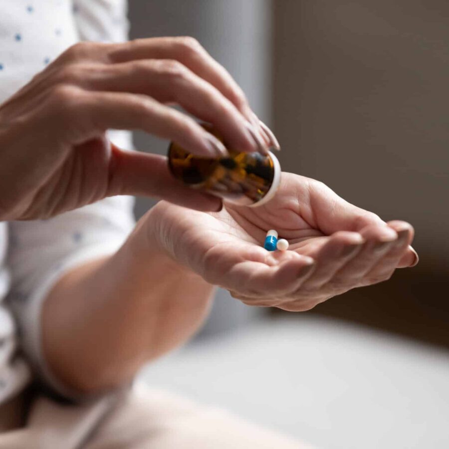 Pouring Pills From Bottle