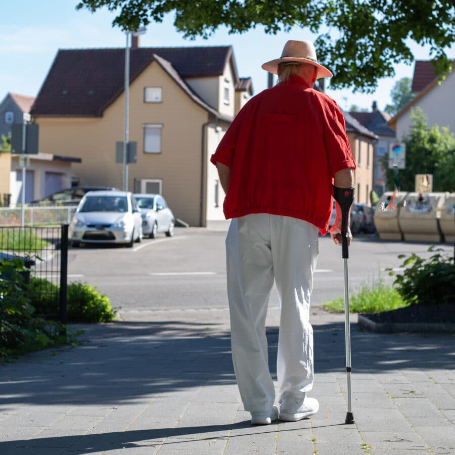 Senior Man with Crutch