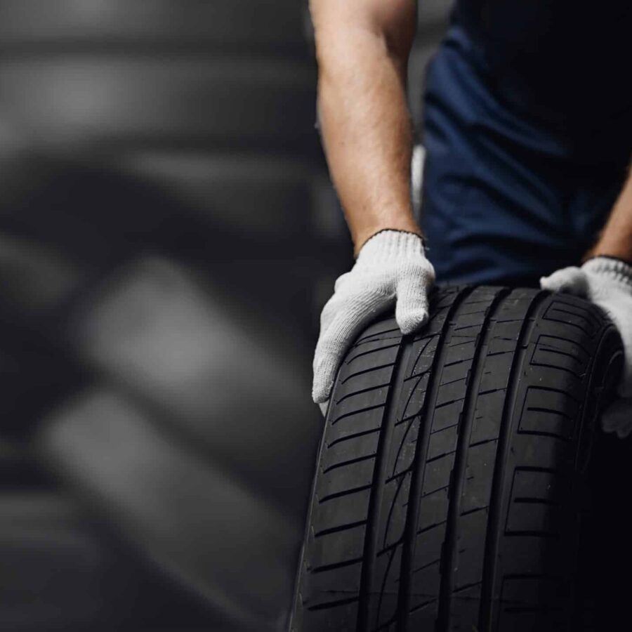 Mechanic Holding New Tire